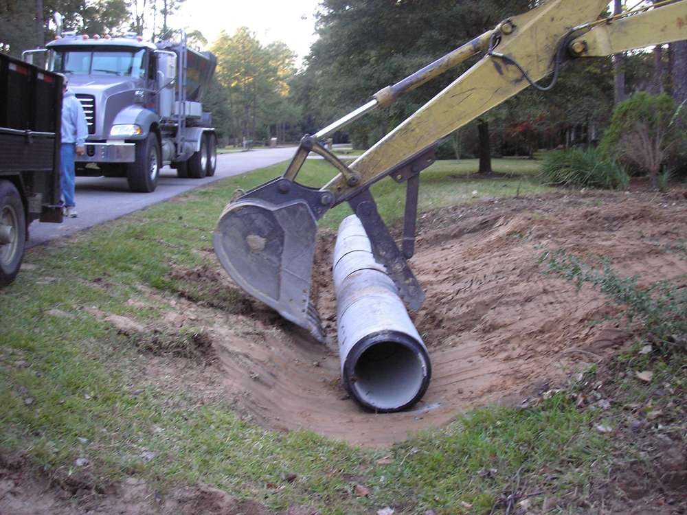 Concrete culvert installation in Tomball TX
