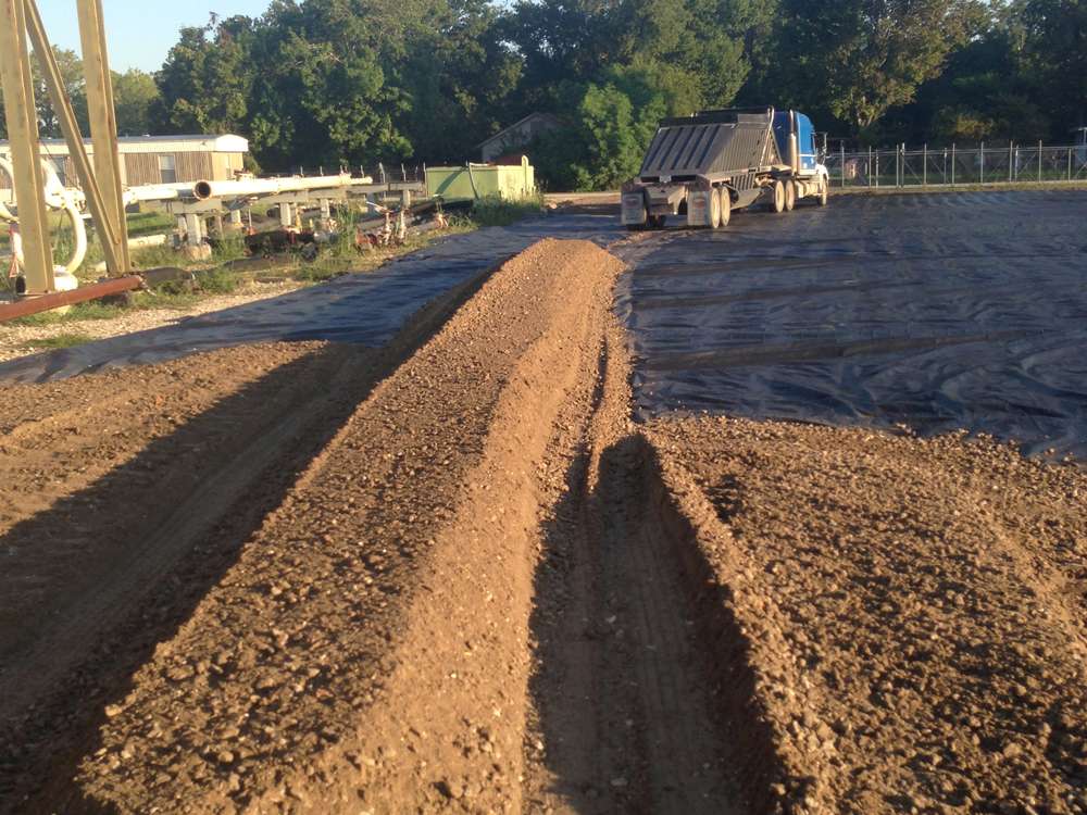 Laydown yard construction in progress with equipment