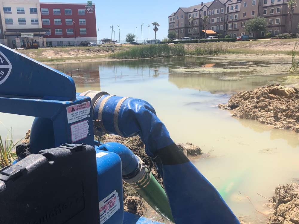 Retention pond before restoration in Houston TX