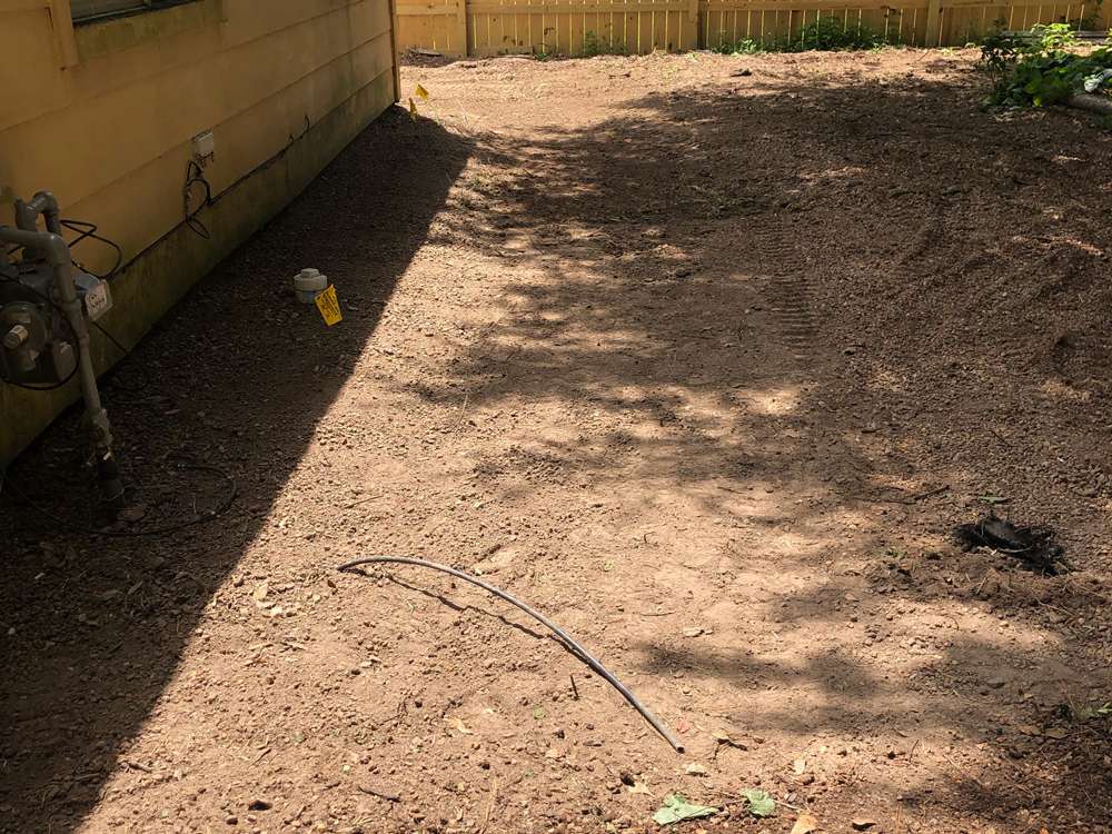 Swale keeping water away from house foundation