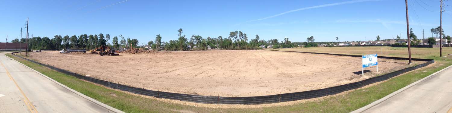 Silt fence installation along construction perimeter