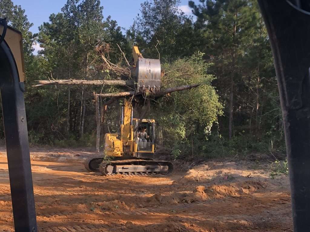Excavator Carrying Brush